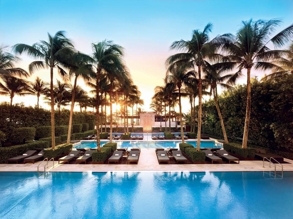 Resort pool with palm trees